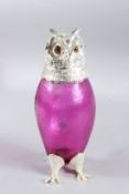 A GOOD LARGE RUBY TINTED GLASS AND PLATE OWL NOVELTY DECANTER. 11ins high.