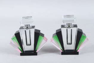 A MEDIUM SIZED PAIR OF BLACK ART DECO DESIGN SCENT BOTTLES. 4.5ins high.