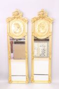 A PAIR OF LOUS XVITH STYLE GILTWOOD SLIM MIRRORS with classical faces. 5ft 9ins high x 1ft 6ins