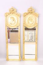 A PAIR OF LOUS XVITH STYLE GILTWOOD SLIM MIRRORS with classical faces. 5ft 9ins high x 1ft 6ins