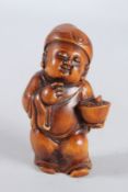 A CHINESE CARVED WOOD FIGURE.