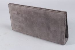 A JANE SHILTON GREY SUEDE CLUTCH BAG.
