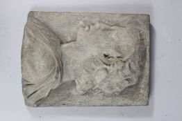 AFTER THE ANTIQUE. A CAST MARBLE PLAQUE, YOUNG MAN'S HEAD. 14ins x 10ins.