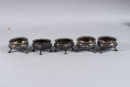 A PAIR OF GEORGE II OVAL SALTS, London 1736 and three circular plated salts.