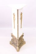 A GOOD WHITE MARBLE TRIANGULAR SHAPED COLUMN with ormolu mounts, on claw feet. 3ft 7ins high.