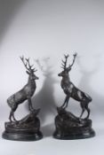 AFTER JULES MOIGNIEZ (1835 - 1894) FRENCH. A PAIR OF BRONZE STAGS. Signed, on a marble base. 28ins