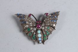 A DIAMOND, EMERALD, RUBY AND SAPPHIRE BUTTERFLY BROOCH.