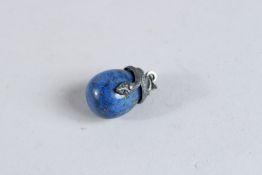 A SILVER LAPIS SNAKE EGG PENDANT.
