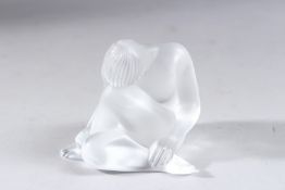 A LALIQUE GLASS KNEELING NUDE WOMAN, etched Lalique, France. 2.5ins high, boxed.