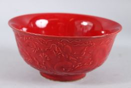 A CHINESE RED PORCELAIN CIRCULAR BOWL. 6ins diameter.