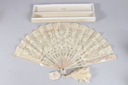A TIFFANY & CO BRUSSELS NEEDLEPOINT AND BOBBIN LACE FAN IN MOTHER-OF-PEARL. 19ins wide open, in a
