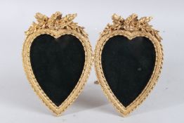 A GILT BRONZE DOUBLE HEART SHAPED FRAME.