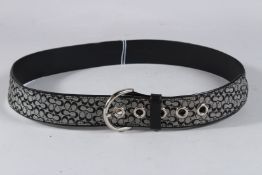 A COACH LEATHER BELT.