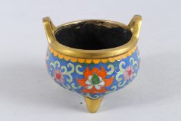 A CHINESE BRONZE AND CLOISONNE CENSER. 4ins diameter.50