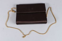 A LADIES' BLACK HARRODS BAG.