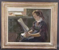 20TH CENTURY SCHOOL A seated woman reading by a window, oil on canvas, signed with initials, A.T.K