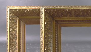 A PAIR OF LARGE GILTWOOD AND GESSO FRAMES rebate size 34.5