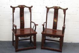 A PAIR OF CHINESE RED, BLACK, AND GILT LACQUER ARMCHAIRS, decorated with landscape panels,