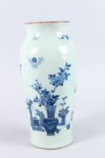 A CHINESE BLUE AND WHITE PORCELAIN VASE, painted with vases of flowers and other objects. 36cms