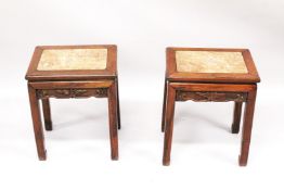 A PAIR OF CHINESE MARBLE INSET RECTANGULAR STANDS, 51cms high, top 41cms x 31cms.