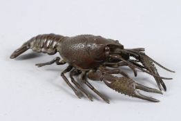 A GOOD JAPANESE BRONZE LOBSTER with articulated arm and body. 10ins long.