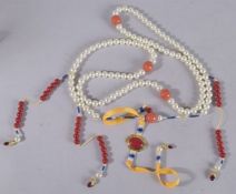 A DECORATIVE SET OF CHINESE COURT BEADS.