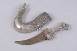 A LARGE OMANI WHITE METAL MOUNTED JAMBIYA, 36cms long.