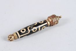 A TIBETAN TIANZHU MOUNTED BRONZE pendant. 3.5ins high.