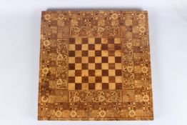 A VERY FINE AND LARGE EARLY 19TH CENTURY MARQUETRY INLAID WOODEN CHESS BOARD. 23ins x 23ins.