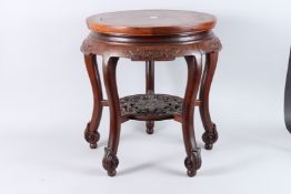 A CHINESE HARDWOOD CIRCULAR LOW TABLE OR STAND, with burr wood central panel, carved frieze, pierced