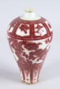 A CHINESE PORCELAIN MEIPING SHAPE VASE with underglaze red decortion. 23cms high.