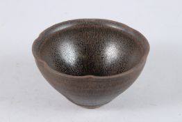 A PETAL SHAPED JIAN WARE CIRCULAR BOWL. 5ins diameter.