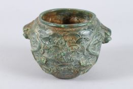 A GOOD CARVED GREEN JADE VASE carved with dragons. 4.5ins high.