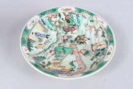 A CHINESE FAMILLE VERTE CIRCULAR DISH painted with figures and animals. Bears mark: ai-yeh and