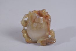 A FINE CHINESE NATURALISTIC CARVED JADE BRUSH WASHER VASE, with relief deer and crane and foliate