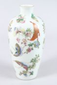 A CHINESE PORCELAIN VASE, painted with butterflies and flowers, red seal mask to base. 25cms high.
