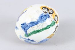 A TURKISH OTTOMAN PORCELAIN HANGING BOWL with figures and calligraphy. 5ins high.