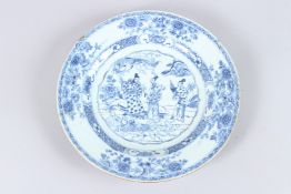 A CHINESE BLUE AND WHITE CIRCULAR PLATE decorated with three figures. 11ins diameter.
