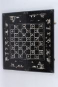 A GOOD MOTHER-OF-PEARL INLAID BACKGAMMON CHESS BOARD. 25ins long x 11ins wide.