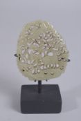 A FINE 19TH CENTURY CHINESE CARVED AND PIERCED JADE PLAQUE, depicting a deer and crane amongst