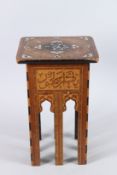 A 19TH CENTURY OTTOMAN INLAID WOODEN TABLE. 17ins high.
