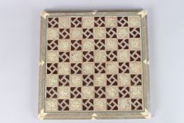 A VERY FINE AND LARGE SYRIAN MARQUESTRY BONE AND MOTHER-OF-PEARL INLAID CHESS BOARD. 17ins x 17ins.