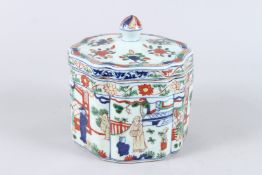 A CHINESE FAMILLE VERTE PORCELAIN BOX AND COVER, the cover painted with flowers, the body with