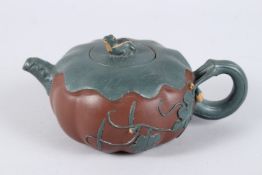 A CHINESE YIXING MELON SHAPE TEAPOT of naturalistic form with a frog knop to the lid. Impressed mark
