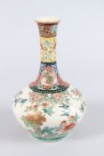 A JAPANESE SATSUMA PORCELAIN BOTTLE VASE, painted with a panel of birds in flight. 22cms high.