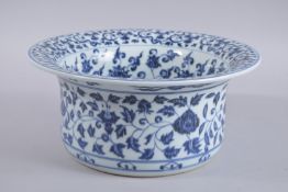 A CHINESE BLUE AND WHITE PORCELAIN BASIN, the interior with lucky symbols, 31cms diameter.