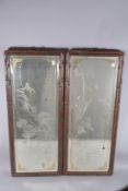 A PAIR OF CHINESE REVERSE ENGRAVED MIRRORS INSET WITHIN BAMBOO STYLE HARDWOOD FRAMES, 111cms x