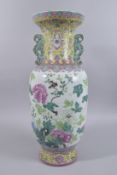 A LARGE CHINESE FAMILLE ROSE PORCELAIN TWIN HANDLE VASE, with enamel-painted birds and native flora,