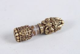 A TIBETAN TIANZHU MOUNTED BRONZE PENDANT. 2.5ins high.