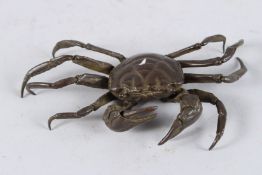 A JAPANESE BRONZE CRAB with articulated arm. 6ins long.